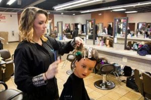 Student styling mannequin head